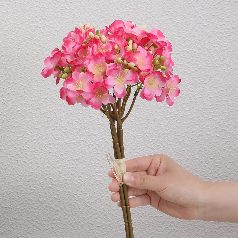 Artificial flower bouquet with delicate blooms