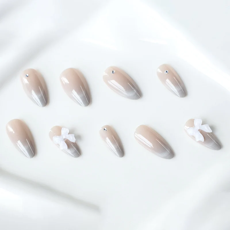 Elegant Rhinestone and Bow Nail Art Extensions Stornfield