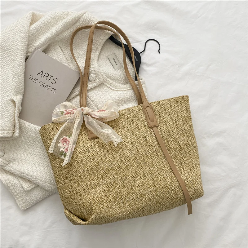 Elegant Woven Straw Tote Bag with Decorative Bow