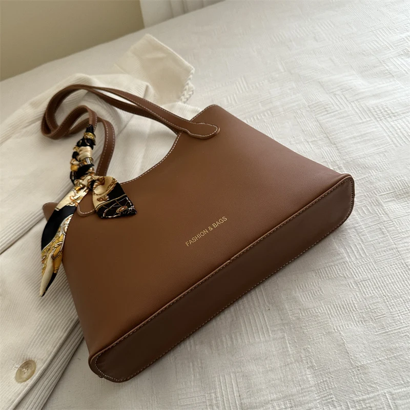 Elegant Structured Tote Handbag with Decorative Scarf