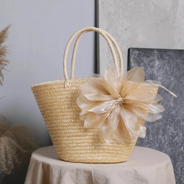 Stylish basket bag with eye-catching flower detail Stornfield