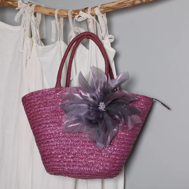 Stylish basket bag with eye-catching flower detail Stornfield