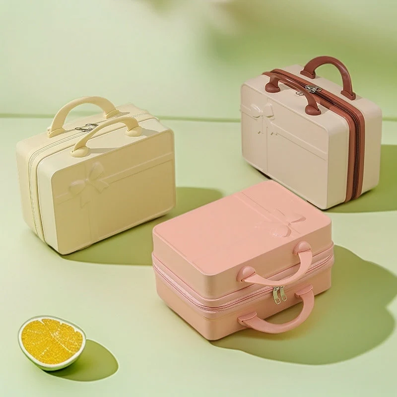 structured hard-shell cosmetic travel case with embossed bow and dual top handles Stornfield