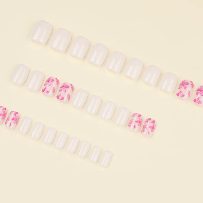 Stylish artificial nail design with floral accents Stornfield
