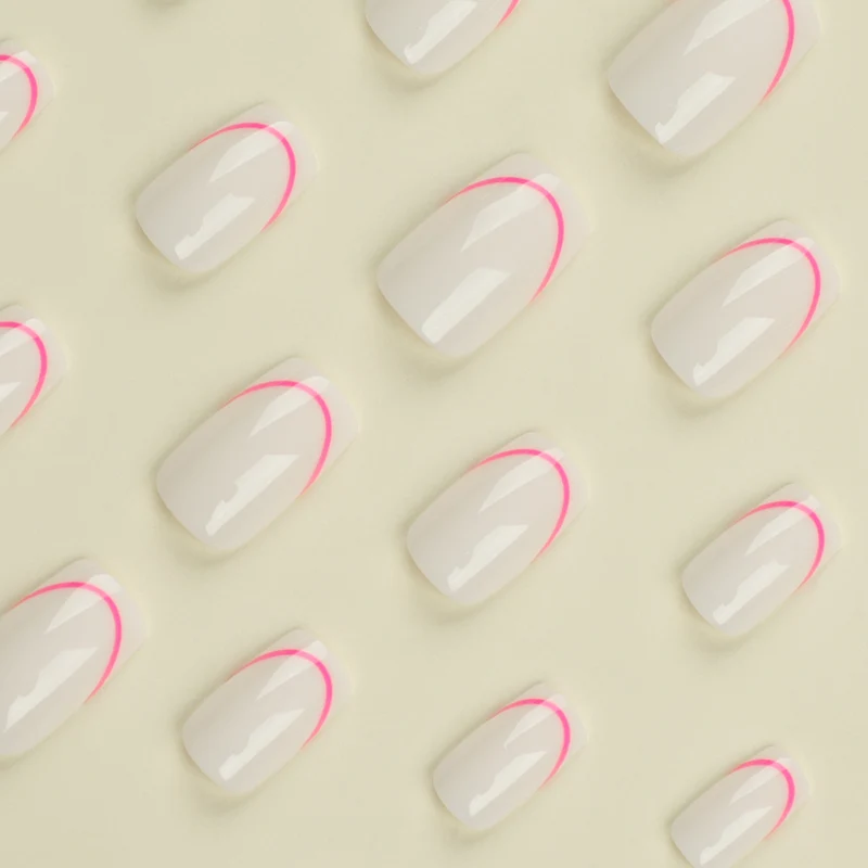 Stylish artificial nails with elegant French tip and modern accents Stornfield