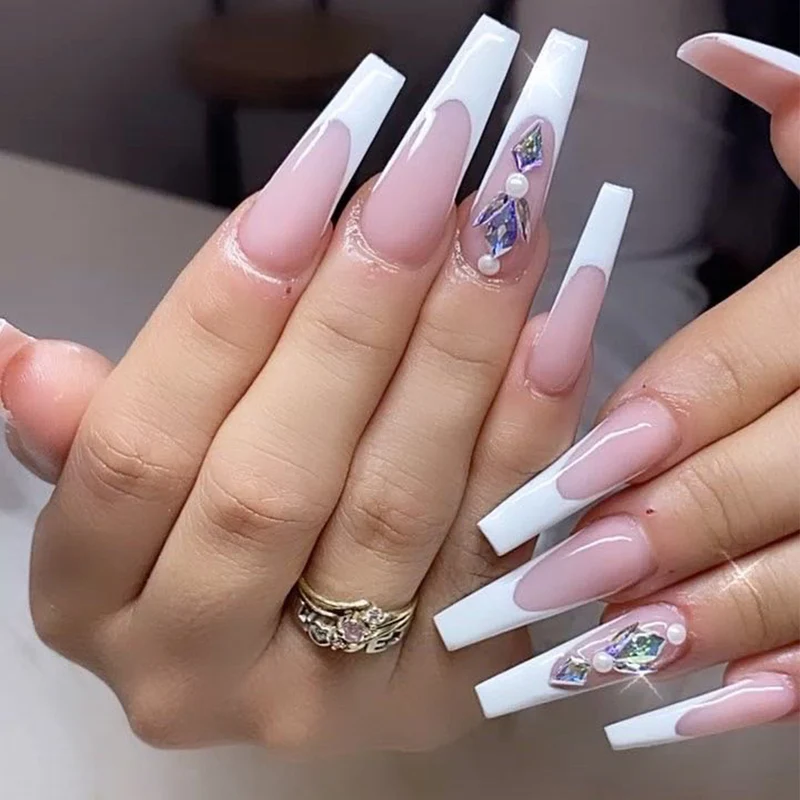 Premium Nail Extensions with Elegant Designs and Glitter Accents Stornfield