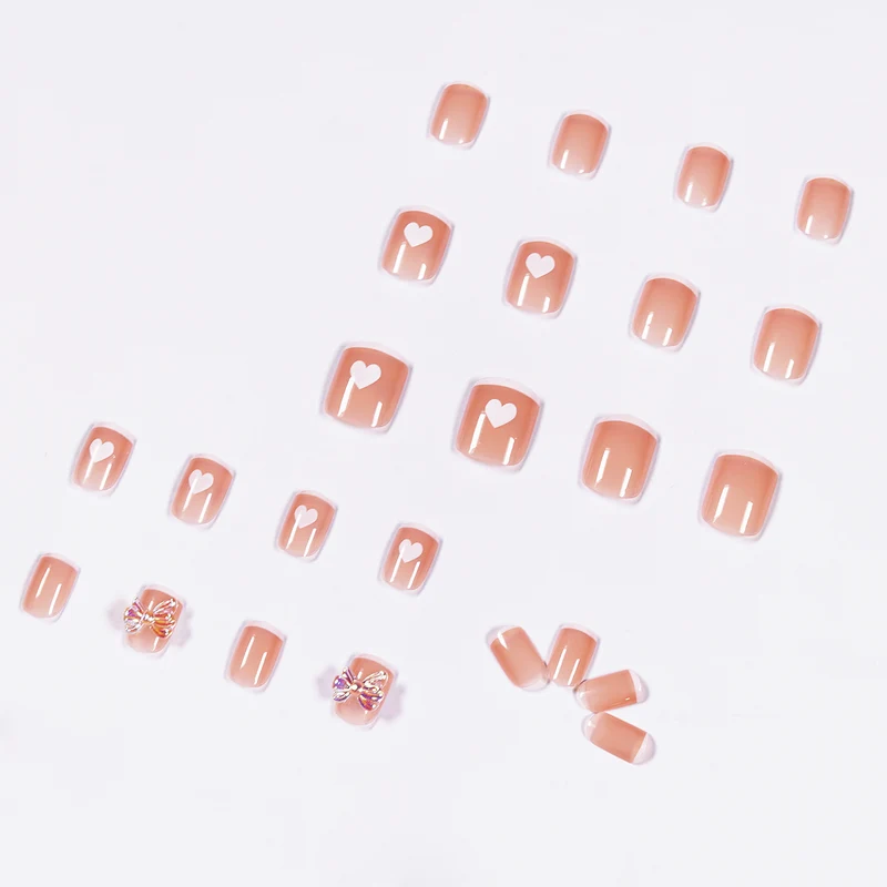 Nail art with heart and butterfly motifs Stornfield