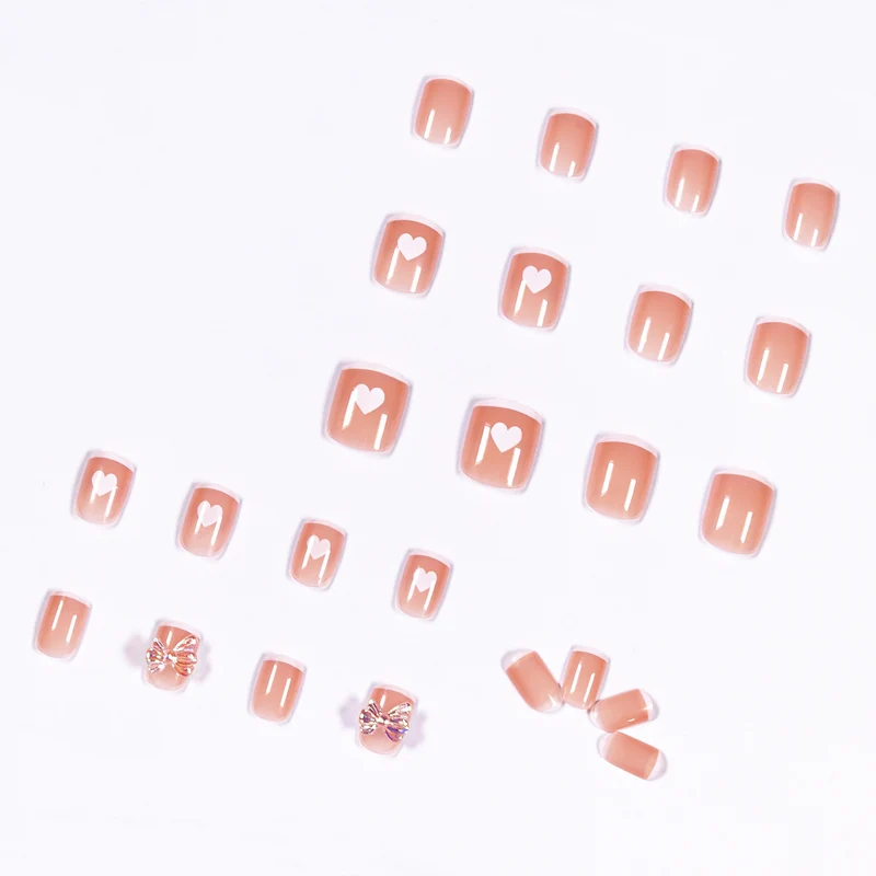 Nail art with heart and butterfly motifs Stornfield