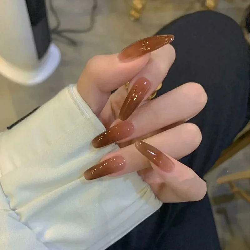 Luxurious artificial nails in modern stiletto design Stornfield