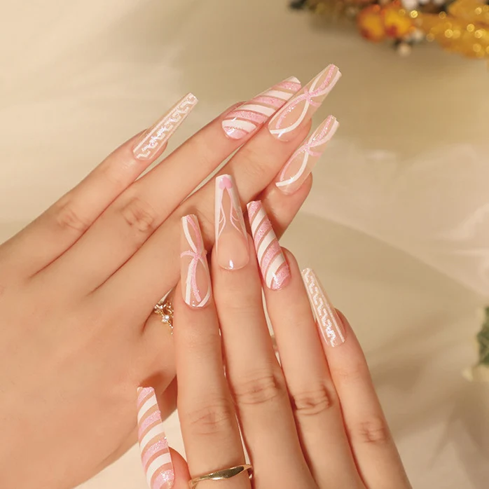 Translucent artificial nails with delicate patterns Stornfield