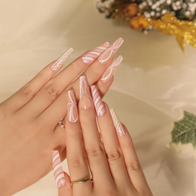 Translucent artificial nails with delicate patterns Stornfield