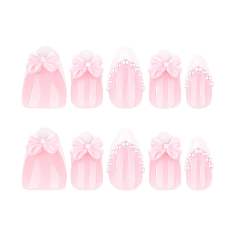Artful Stiletto Nails with Delicate Bow Accents Stornfield