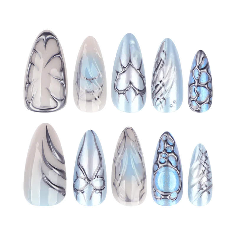Artful stiletto nails with playful metallic details Stornfield