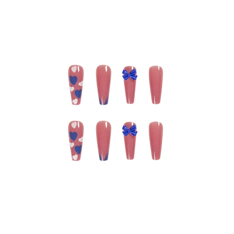 Artful stiletto nails with modern heart and bow motifs Stornfield