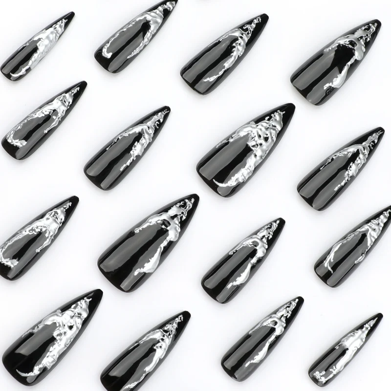 Artistic stiletto nails with modern metal effect Stornfield