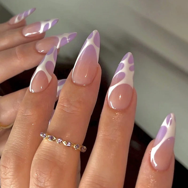 Artistic stiletto nails with modern marble pattern Stornfield