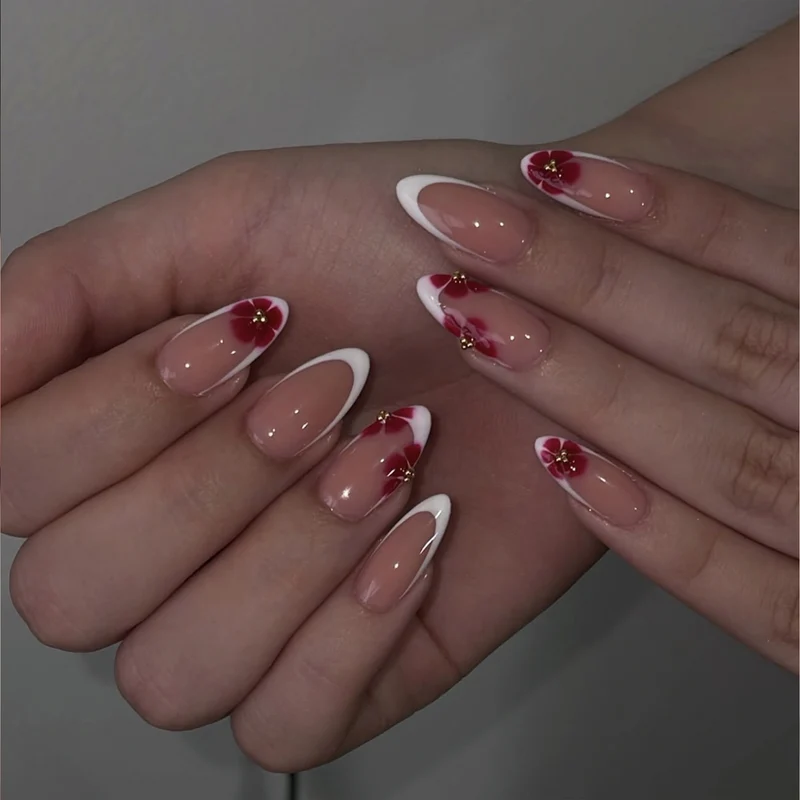 Artistic stiletto nails with luxurious floral design Stornfield