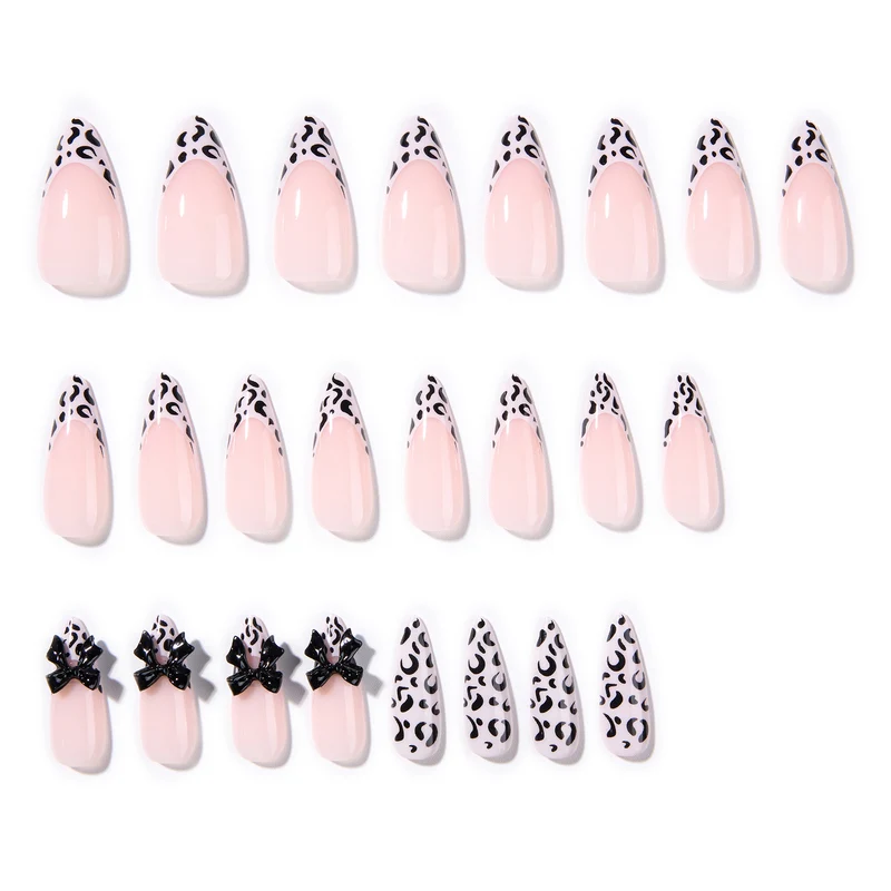 Artful Stiletto Nails with Leopard Print and Bow Accent Stornfield