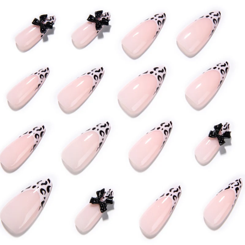 Artful Stiletto Nails with Leopard Print and Bow Accent Stornfield
