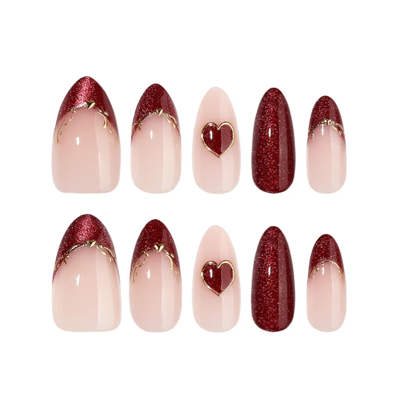 Artful stiletto nails with heart designs and glitter embellishment Stornfield