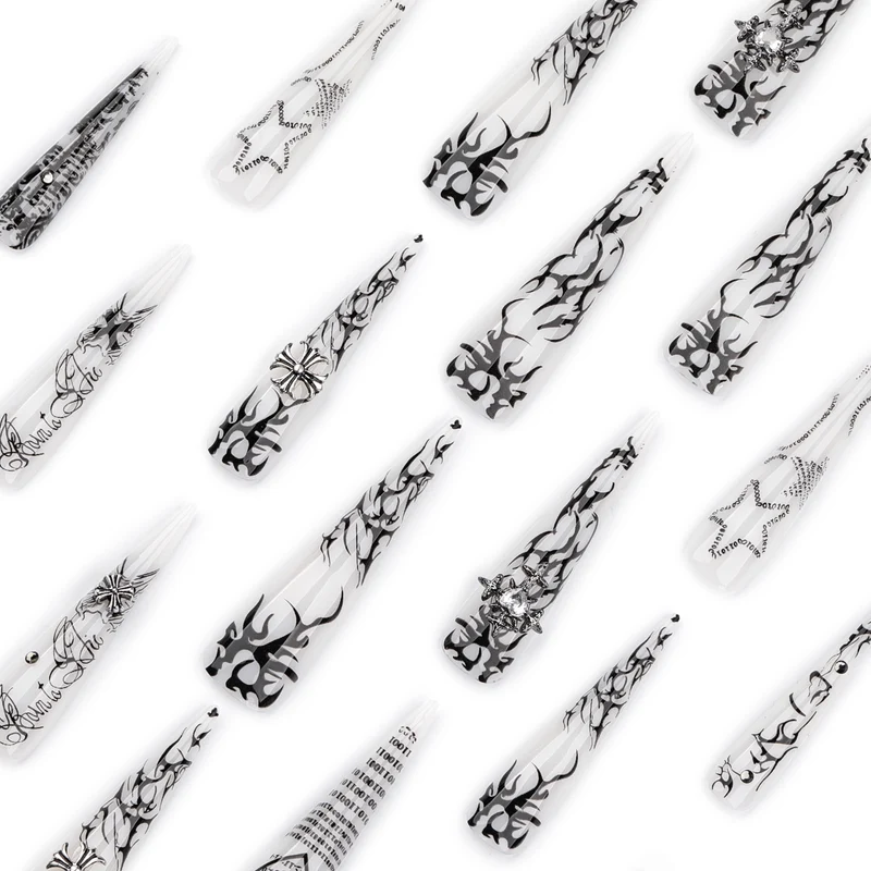 Artful stiletto nails with gothic pattern and embellishments Stornfield