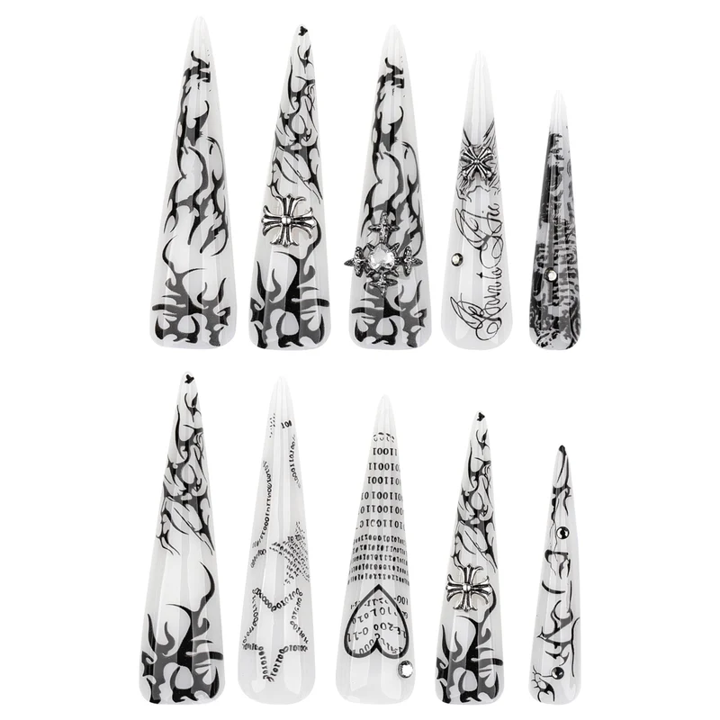 Artful stiletto nails with gothic pattern and embellishments Stornfield