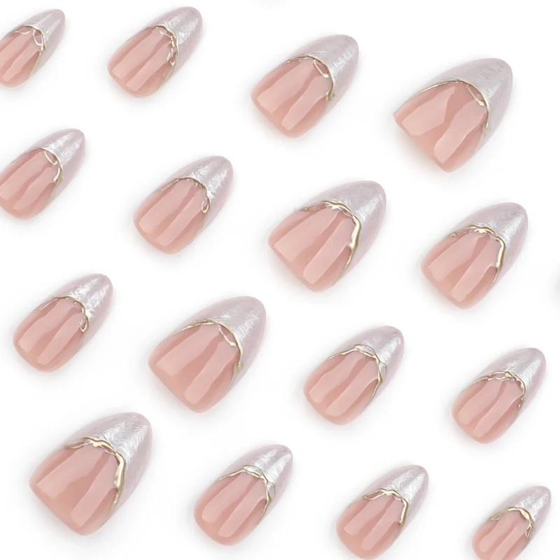 Artful Stiletto Nails with Golden Accents Stornfield