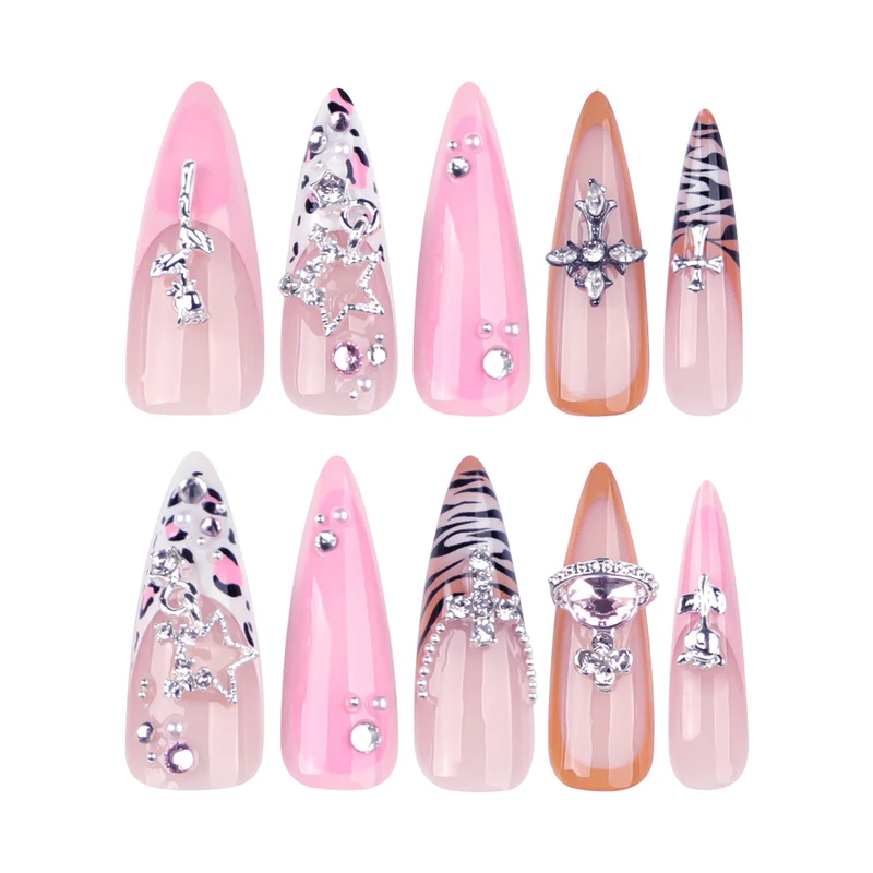 Artful stiletto nails with glitter and rhinestone embellishments Stornfield