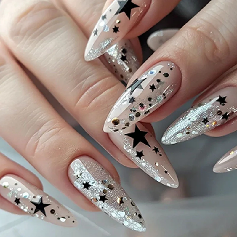 Artistic stiletto nails with glitter and star design Stornfield