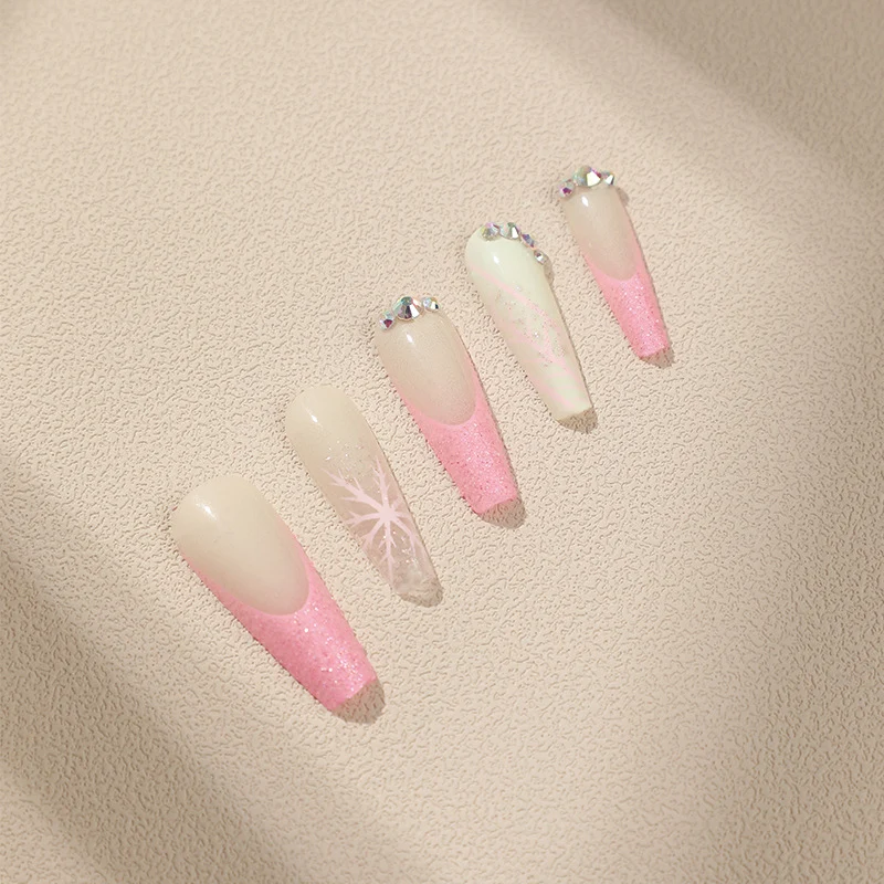 Artistic stiletto nails with glitter and snowflake design Stornfield