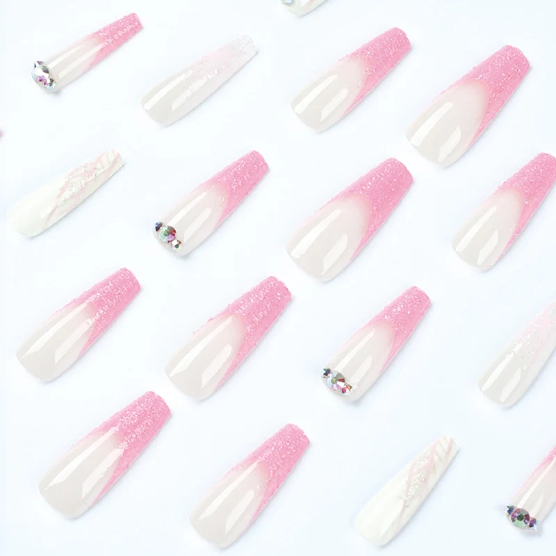 Artistic stiletto nails with glitter and snowflake design Stornfield