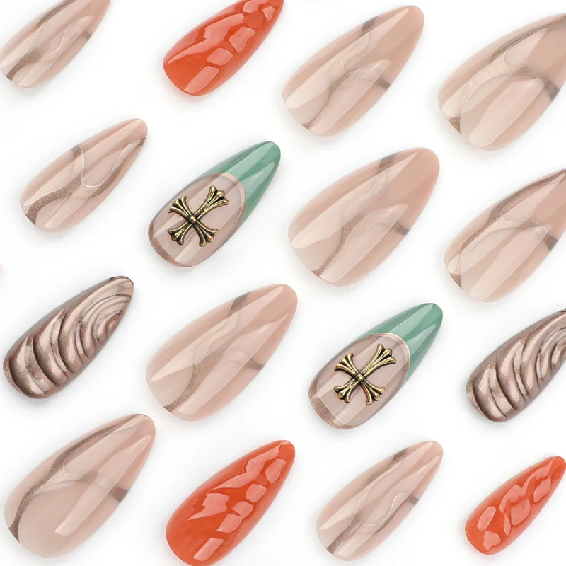 Artful stiletto nails with glitter and motif decorations Stornfield
