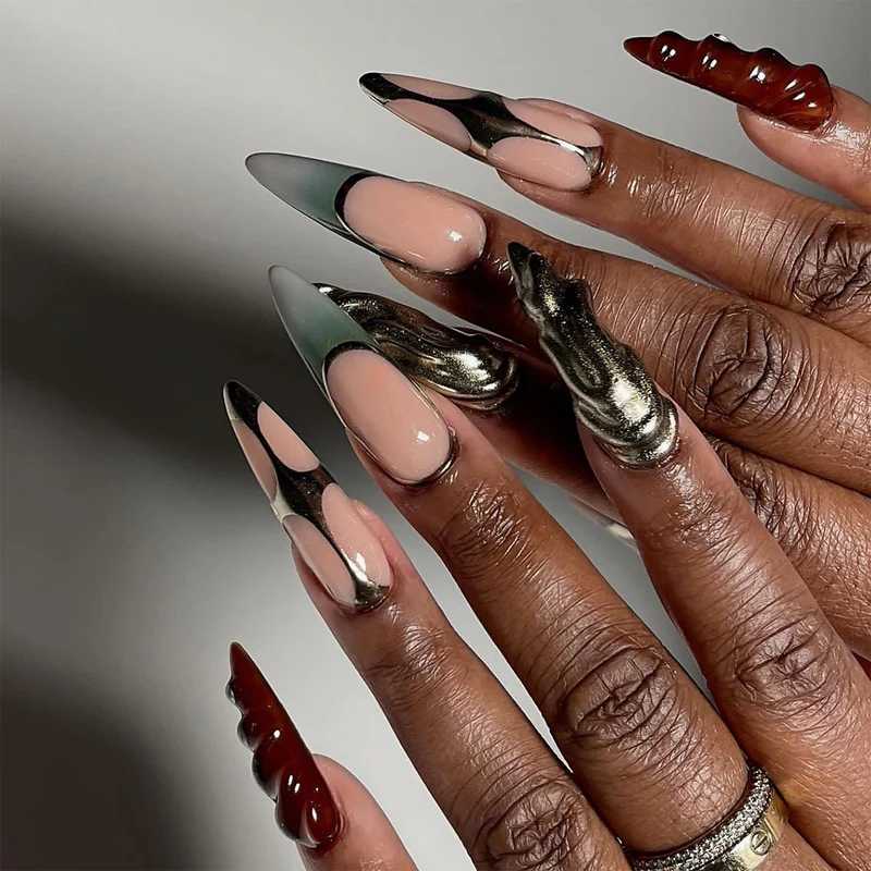Artistic Stiletto Nails with Glitter and Metallic Effects Stornfield