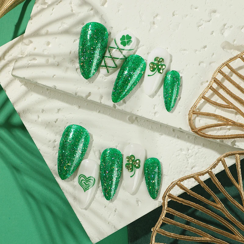 Artistic Stiletto Nails with Glitter and Clover Leaf Designs Stornfield
