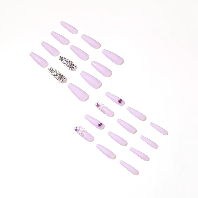 Artistic Stiletto Nails with Glitter and Flower Decorations Stornfield
