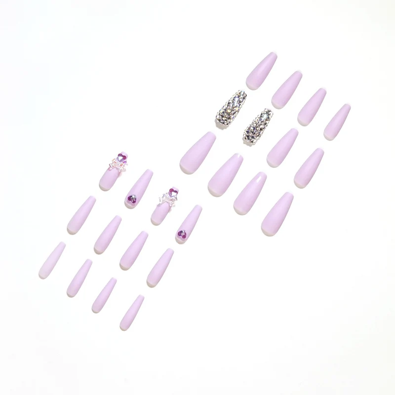 Artistic Stiletto Nails with Glitter and Flower Decorations Stornfield