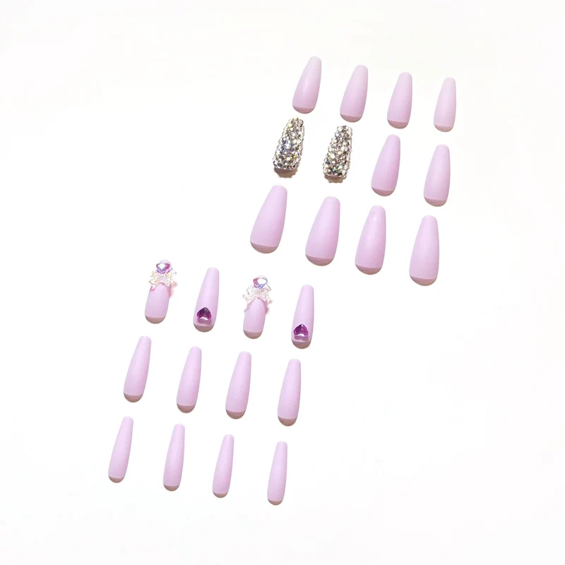 Artistic Stiletto Nails with Glitter and Flower Decorations Stornfield