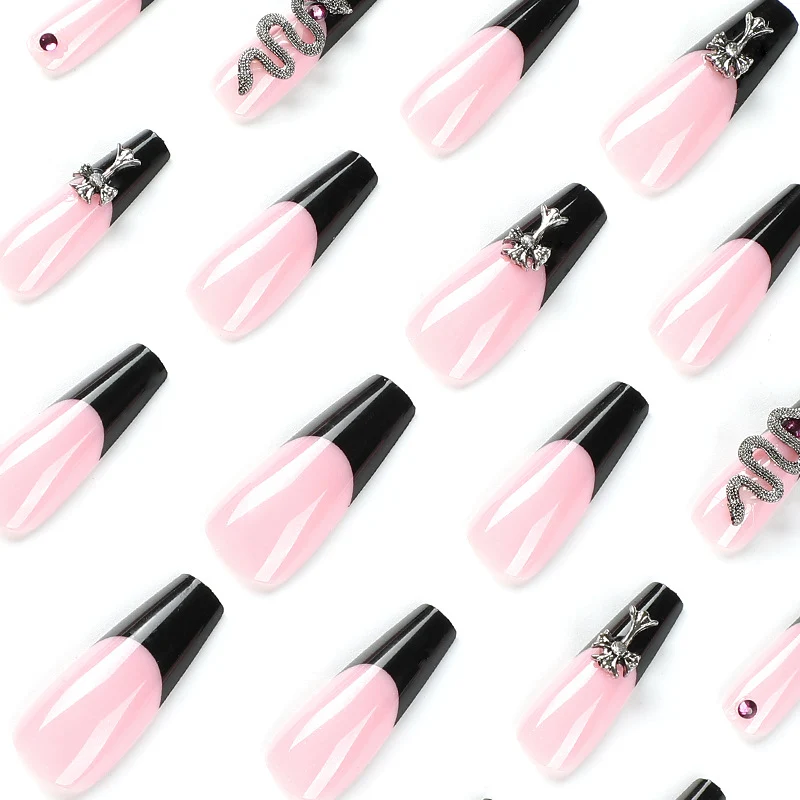 Artful stiletto nails with glitter accents and creative design Stornfield