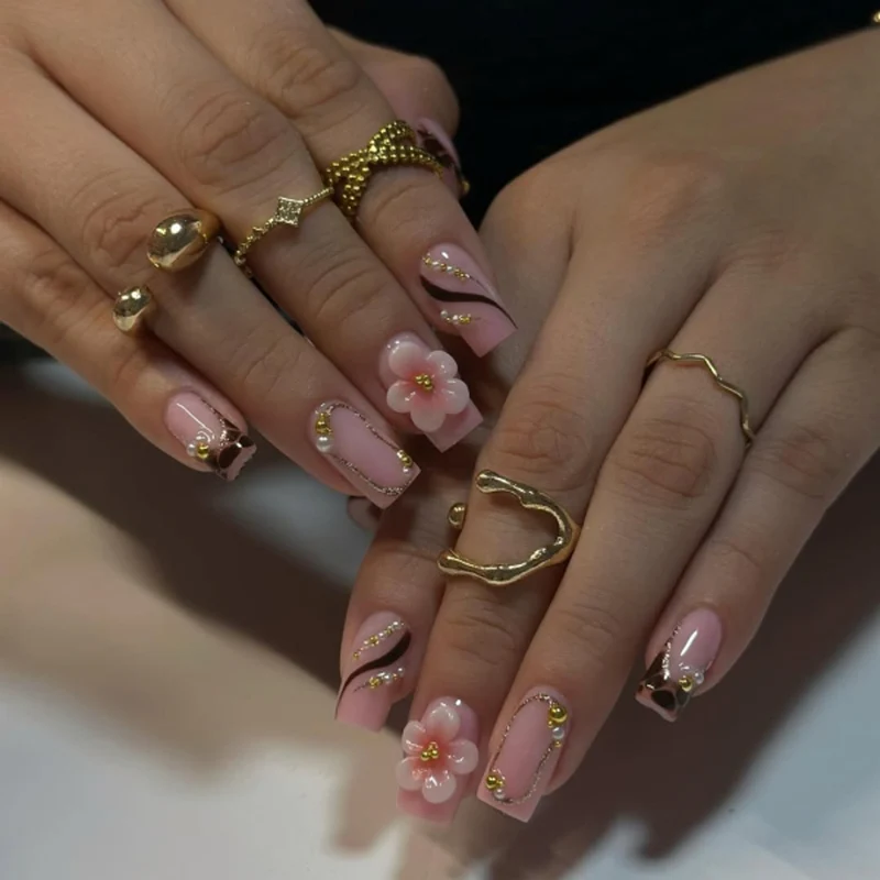 Artful stiletto nails with glitter accents Stornfield