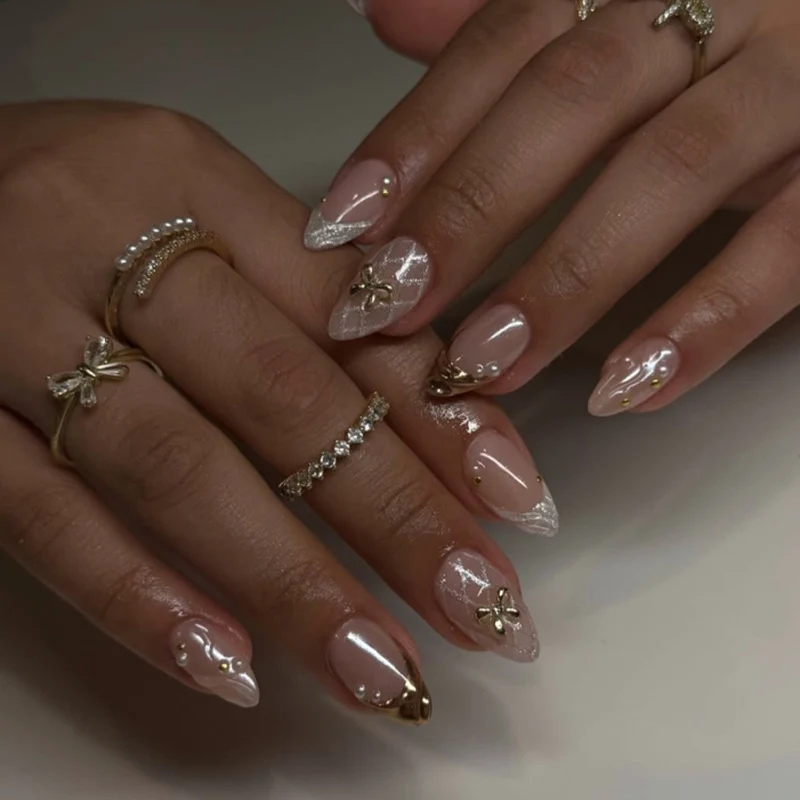 Artful stiletto nails with glitter accents Stornfield
