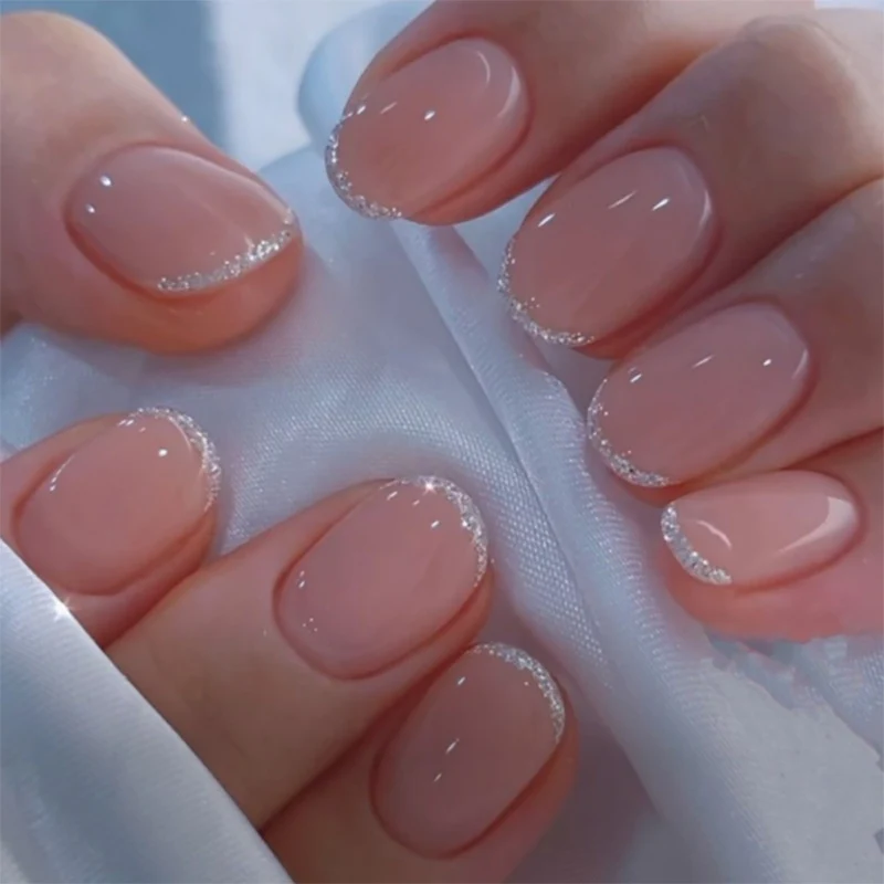 Artful stiletto nails with glitter accents Stornfield