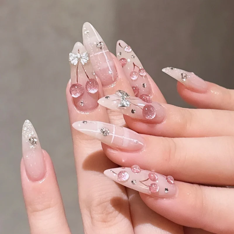 Artful stiletto nails with glitter accents Stornfield
