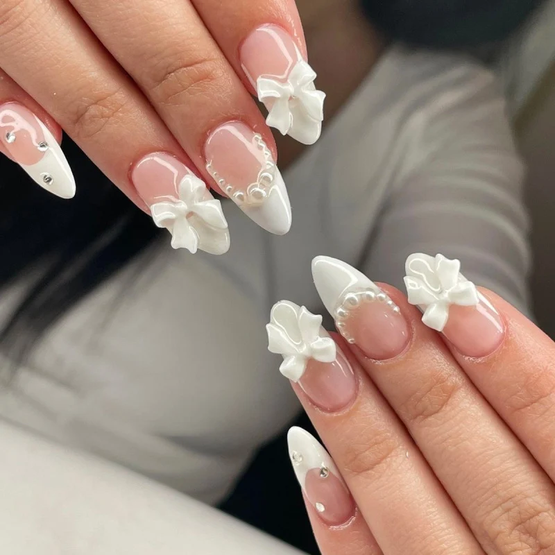 Artful stiletto nails with glitter accents Stornfield