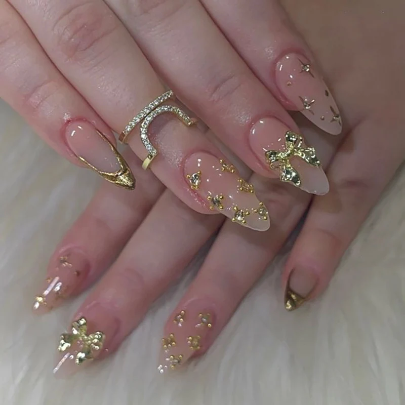 Artful stiletto nails with glitter accents Stornfield