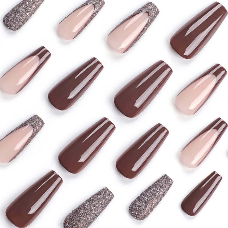 Artful stiletto nails with glitter embellishments Stornfield