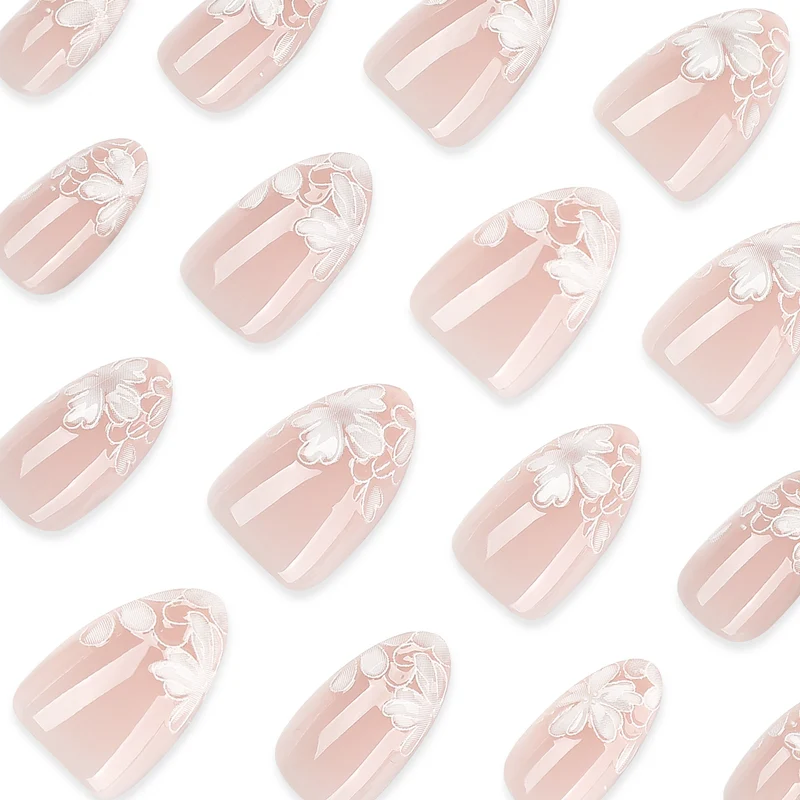 Artistic stiletto nails with floral embellishments Stornfield