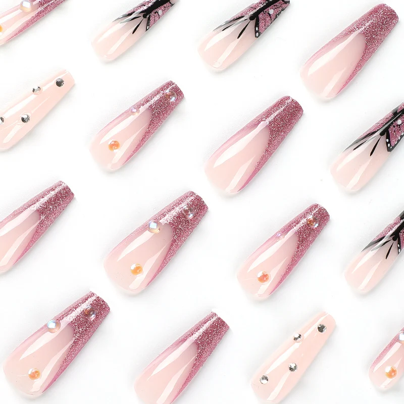 Artful stiletto nails with floral and glittering accents Stornfield