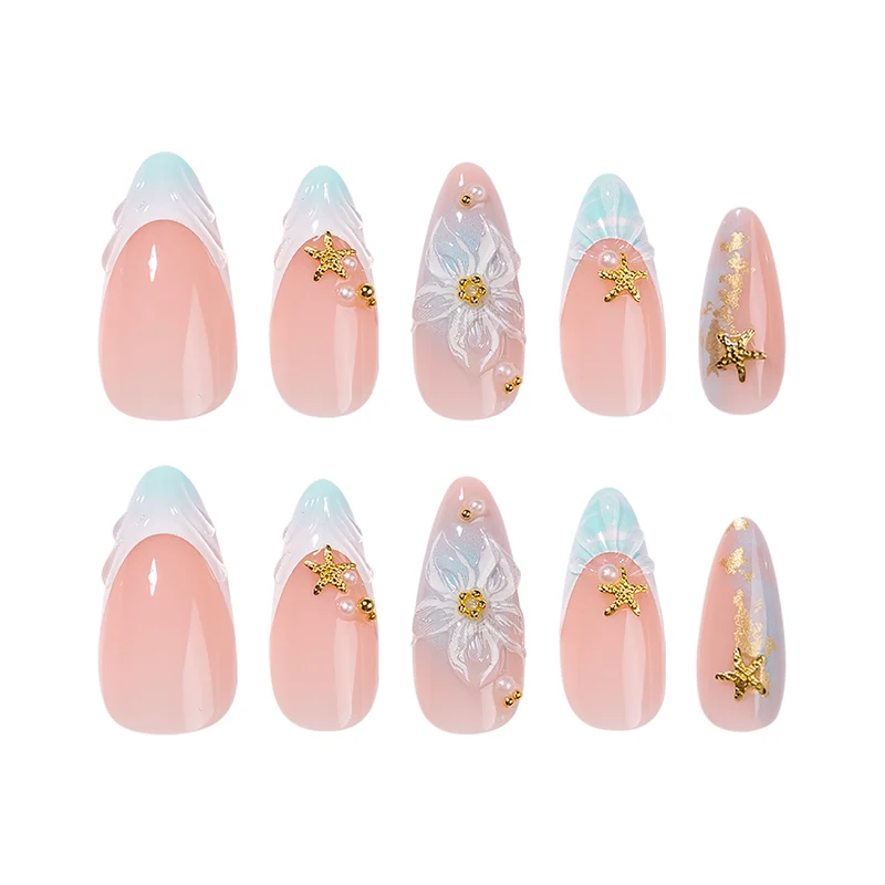 Artful stiletto nails with floral and glamorous accents Stornfield