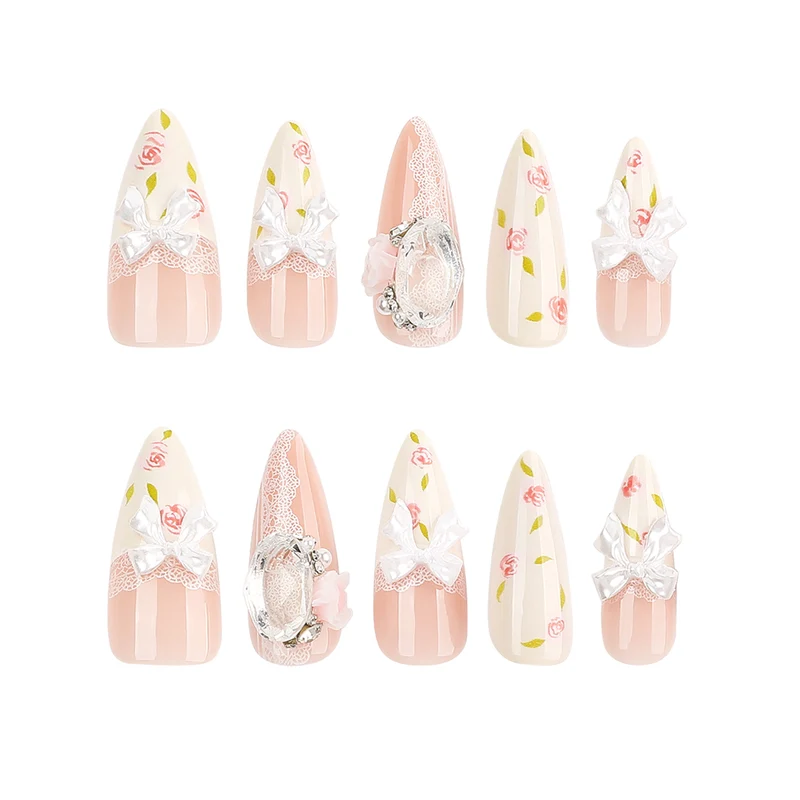 Artful stiletto nails with floral accents and glitter accents Stornfield