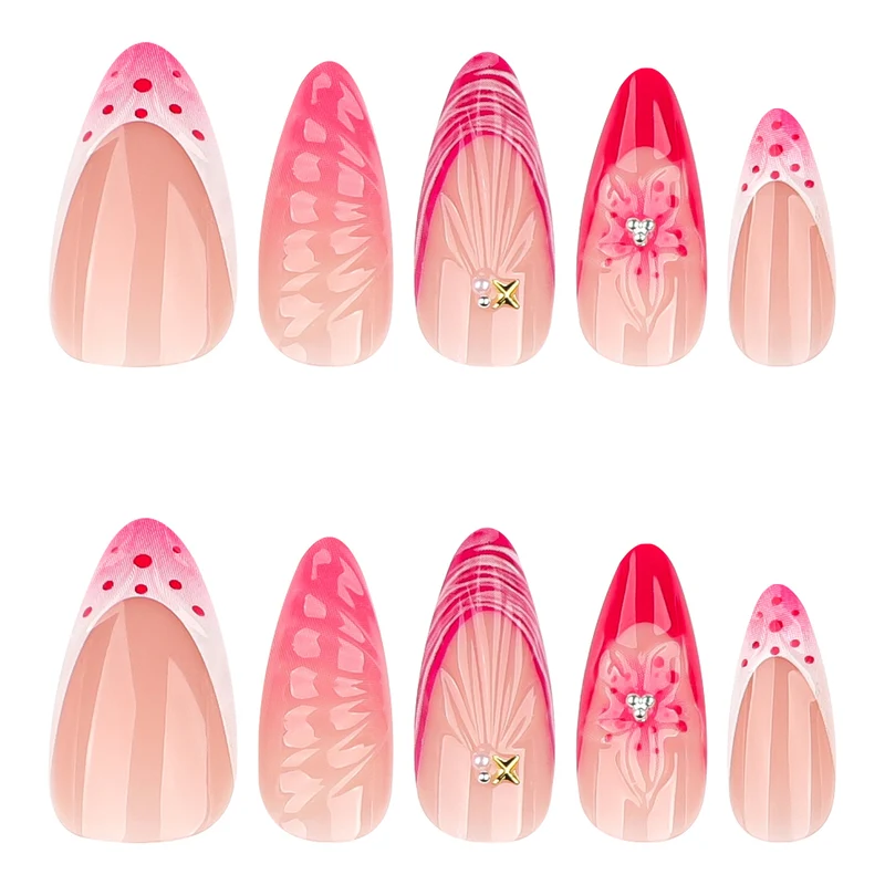 Artful stiletto nails with floral design and glitter accents Stornfield